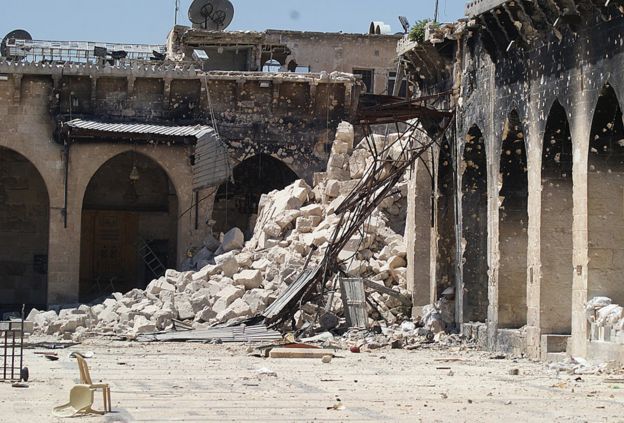 Ruined minaret of Aleppo's Grand Mosque, collapsed in the courtyard