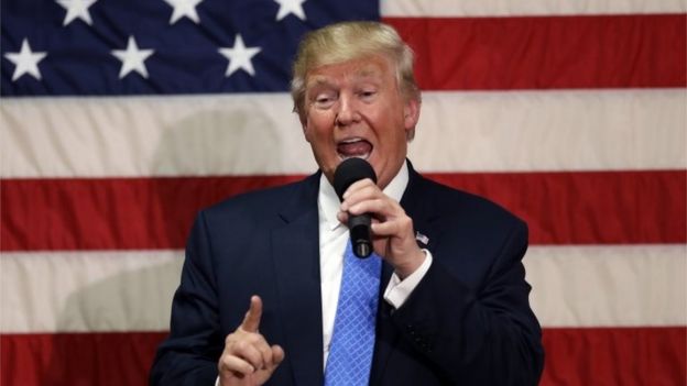 Republican presidential candidate Donald Trump speaks at a town hall-style forum in Sandown, New Hampshire.