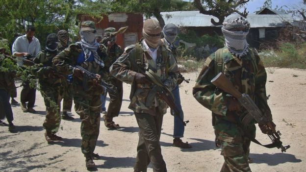 A file photo taken on 5 March 2012 al-Shabab recruits walking down a street in the Deniile district of the Somalian capital, Mogadishu