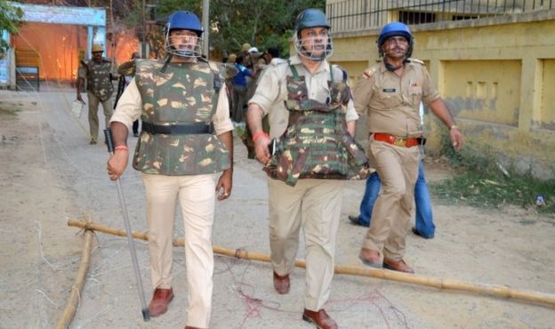 Indian police patrol during clashes with members of a sect said to have been living illegally at the Jawahar Bagh park in Mathura on June 2, 2016