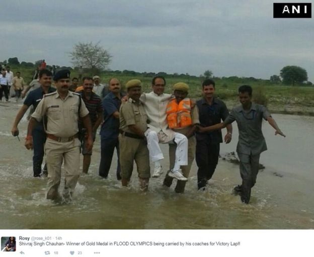 Shivraj Singh Chauhan- Winner of Gold Medal in FLOOD OLYMPICS being carried by his coaches for Victory Lap!!