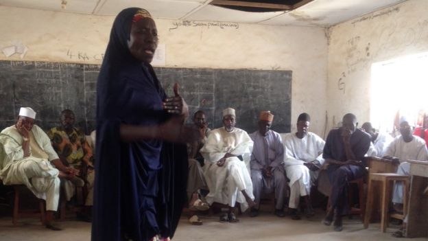 A woman speaks during community leaders meeting in Nigeria's Adamawa state
