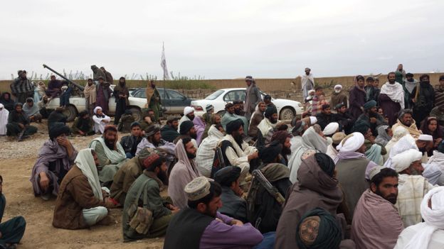 Taliban fighters at the meeting in Farah