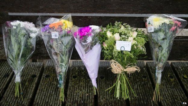 Flowers laid on the Shoreham toll bridge near the plane crash site