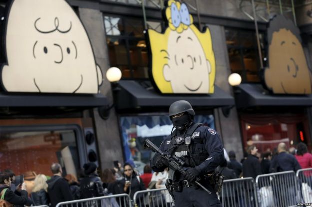 A policeman outside Macy's in Manhattan, New York, 23 November