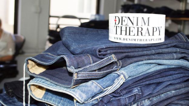 Jeans repaired by Denim Therapy