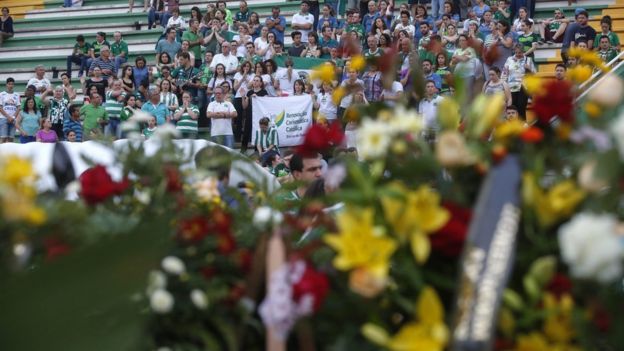 Supporters of Brazilian soccer team Chapecoense attend a vigil ahead of the 3 December tribute to the club's victims of the plane accident in Colombia, at Arena Conda stadium in Chapeco, Brazil, 2 December 2016.