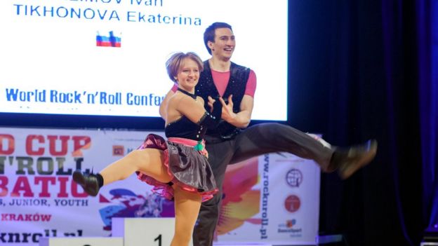 Katerina Tikhonova dances with Ivan Klimov during the World Cup Rock'n'Roll Acrobatic Competition in Krakow, 2014