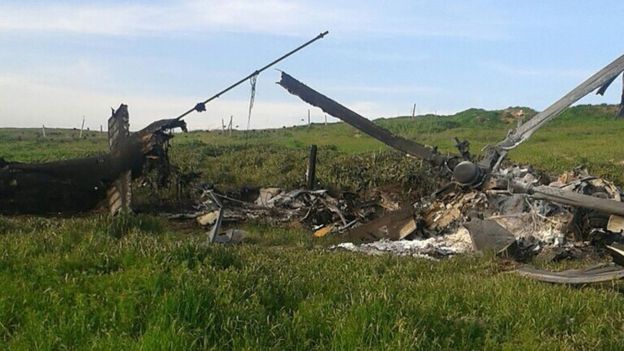 A picture obtained from the Nagorno-Karabakh defence authorities' official website reportedly shows the remains of the downed Azerbaijani Mi-24 helicopter in a field