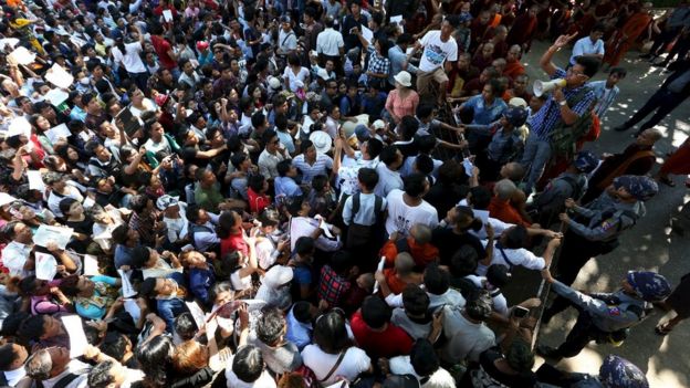 Protesters in front of the Thai embassy in Yangon on 25 December