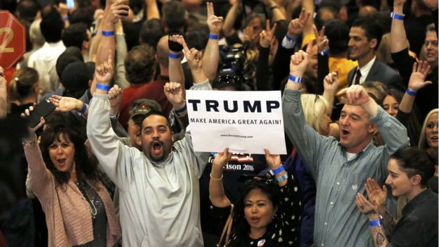 Supporters of Republican U.S. presidential candidate Donald Trump celebrate as television networks declare him the winner of the Nevada Republican caucuses at Trump's Nevada caucus rally in Las Vegas, Nevada, on 23 February 2016.