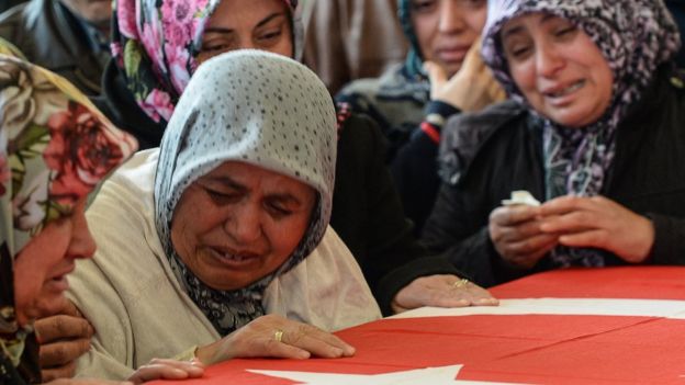 Family members mourn the victim of a suicide attack in Turkey