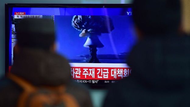 People in Seoul watch a news report on North Korea's first hydrogen bomb test