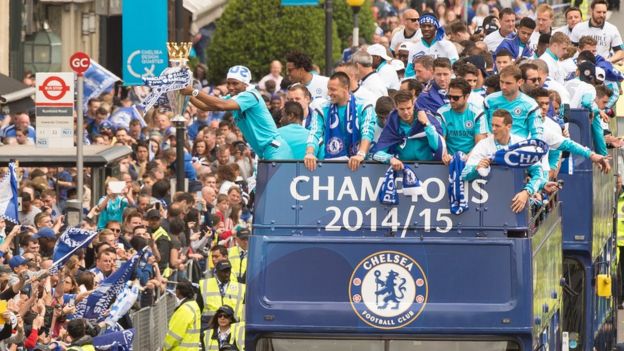 Chelsea players celebrate winning last season's Premier League