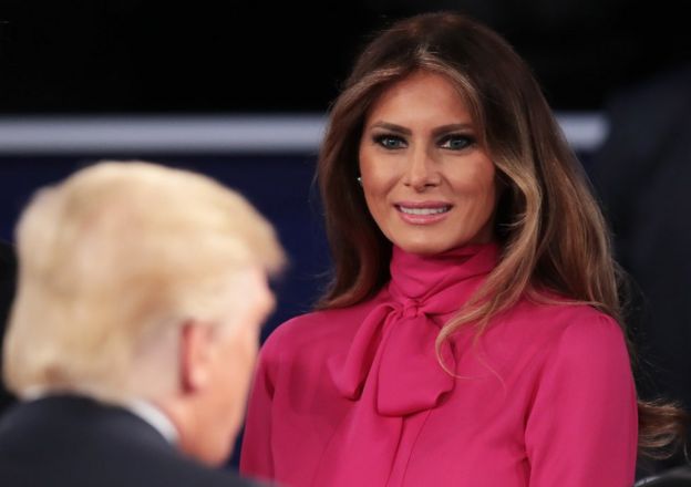 Melania Trump (right) greets her husband after the town hall debate at Washington University on October 9, 2016.