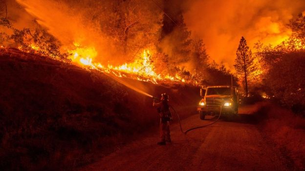 Firefighters tackling Butte fire near San Andreas, California, on 12 September 2015