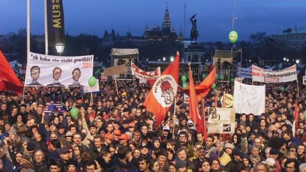 Thousands of demonstrators with banners and flags on their way to Heldenplatz on 19 February 2000 for a demonstration against the new Austrian coalition government between Joerg Haider's right-wing Freedom Party and the conservative Peoples Party