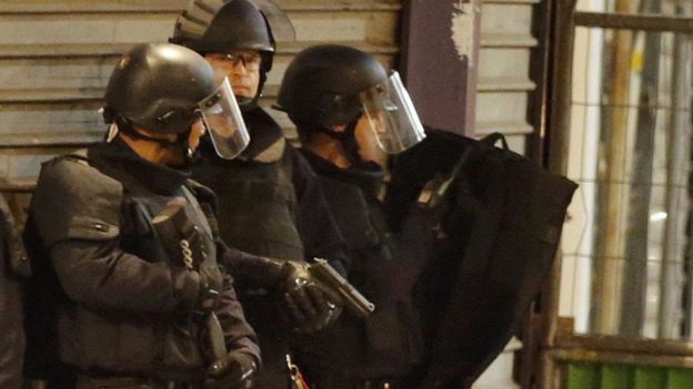 French special forces secure the area as shots are exchanged in Saint-Denis, Paris, 18 November 2015