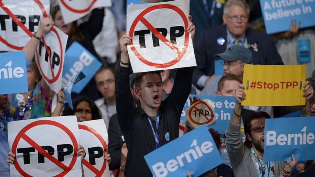 Delegates hold anti-TPP signs at the Democratic Party's convention in Philadelphia, Pennsylvania, 25 July 2016