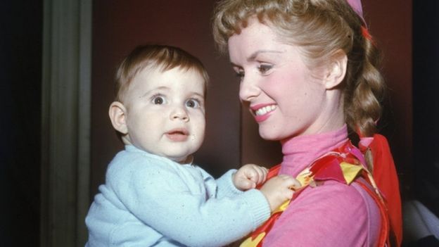 Carrie Fisher as a baby with actress mother Debbie Reynolds