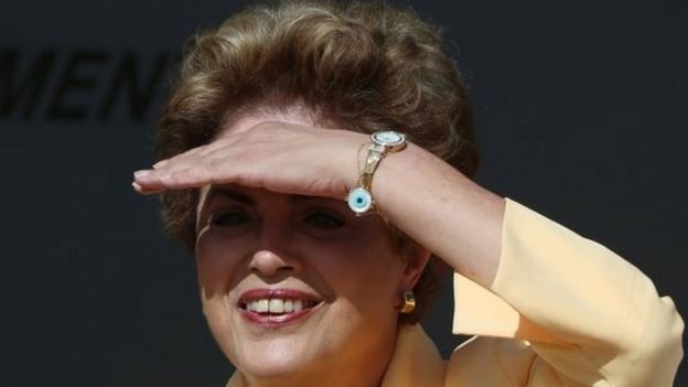 President Dilma Rousseff reacts after visiting the new Embraer KC 390 military transport aircraft in Brasilia, Brazil April 5, 2016.