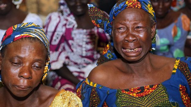 Mothers of missing girls kidnapped in 2014 from their school in Chibok by Islamist group Boko Haram, cry during a rally in Abuja on January 14, 2016.