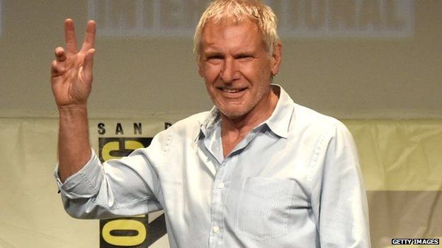 Actor Harrison Ford walks onstage at the Lucasfilm panel during Comic-Con International 2015
