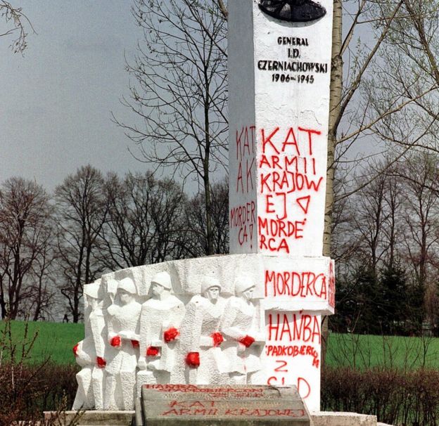 In this file photo from 2001,taken in Pieniezno, Poland, graffiti with insults like 