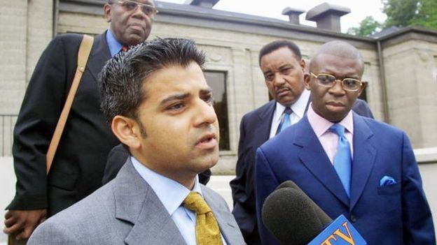Sadiq Khan, solicitor instructed by Nation of Islam in London, speaks briefly to the media outside a schedules press conference August 16, 2001 in Chicago