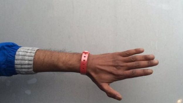 A Lynx House resident with a wristband