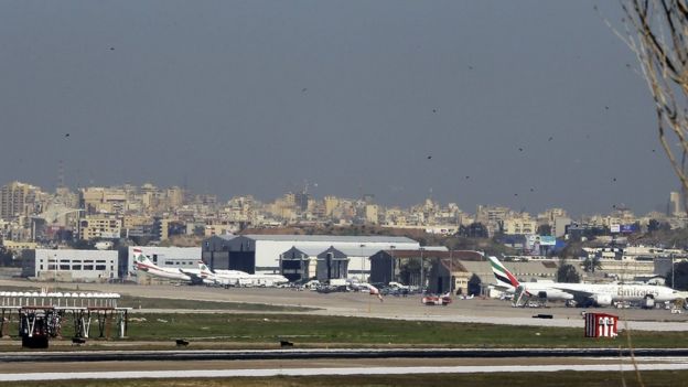 A general view shows a flock of birds flying near the runway at Beirut International airport in the Lebanese capital on 12 January