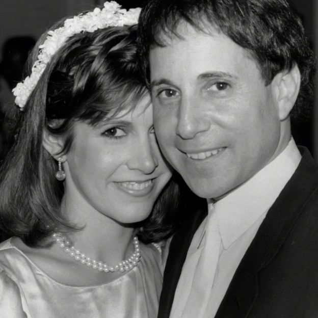 Carrie Fisher and Paul Simon pictured in 1983