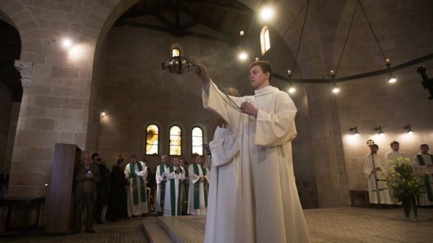 Christian clerics during a Holy Mass at the Church of Loaves and Fishes, in Tabgha