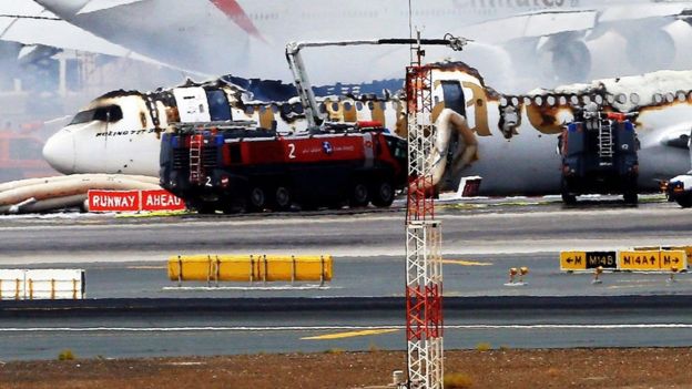 An Emirates airlines Boeing 777-300 on the ground in Dubai airport (3 August 2016)