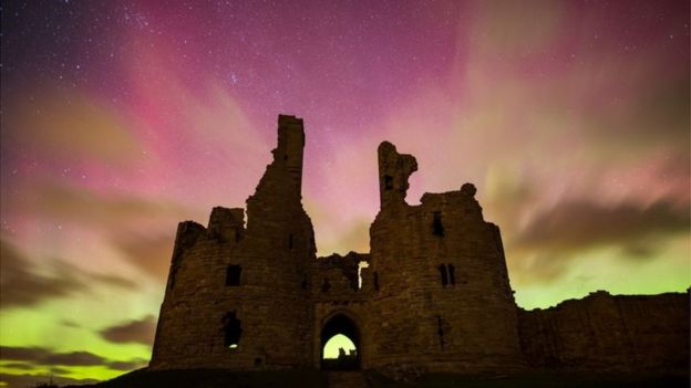 Dunstanburgh Castle near Alnwick in Northumberland made a dramatic setting for Phil Pounder's shot of pink shades of aurora borealis