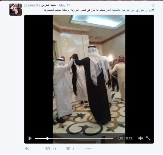 Men dancing at Saudi wedding