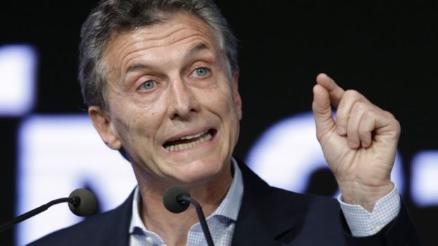 In this Dec. 14, 2015, file photo, Argentina's President Mauricio Macri speaks during a meeting with the Argentine Industrial Union in Buenos Aires, Argentina. Macri is vowing to crack down on drug trafficking amid a national manhunt for three escaped prisoners convicted in drug-related killings. On Monday, Jan. 4, 2016,