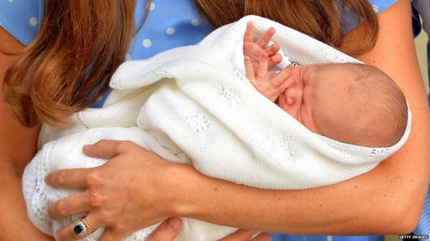 The Duchess of Cambridge cradles Prince George after his birth in 2013