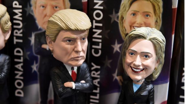 Bobblehead dolls of US Republican presidential nominee Donald Trump and Democratic presidential nominee Hillary Clinton are seen for sale in a gift shop at Philadelphia International Airport, October 20, 2016 in Philadelphia, Pennsylvania