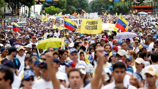 Opponents to Venezuelan President Nicolas Maduro march during a rally in Caracas on September 1, 2016.
