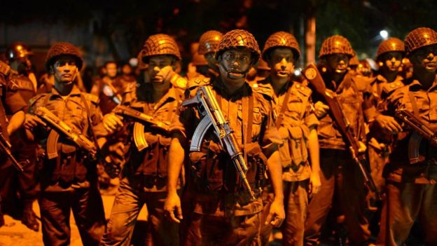 Bangladeshi security forces near restaurant attacked by unidentified gunmen in Dhaka. July 2, 2016