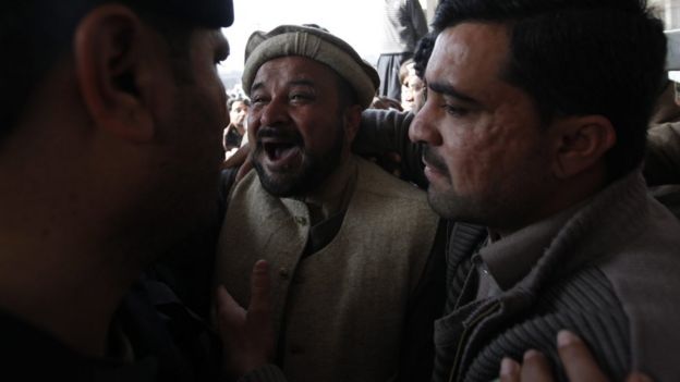 A relative of a victim reacts outside a hospital, following the gun attack on Bacha Khan University, in Charsadda, Pakistan, 20 January