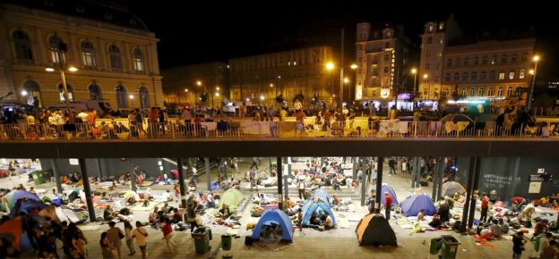 Migrants are seen at a makeshift camp in an underground station in front of the Keleti railway station in Budapest, Hungary, September 3, 2015.