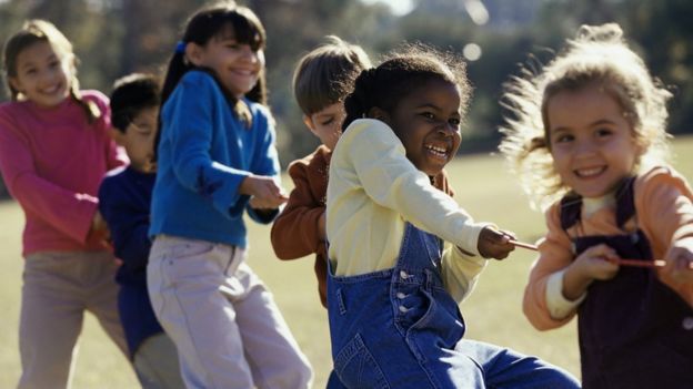 children in a tug of war