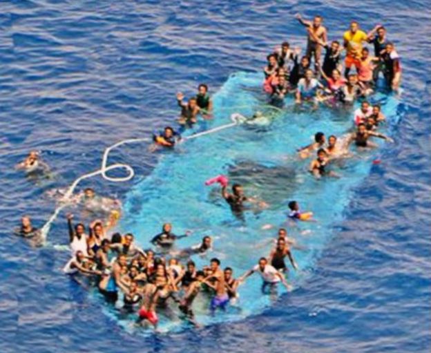 Migrants on capsized boat, 26 May