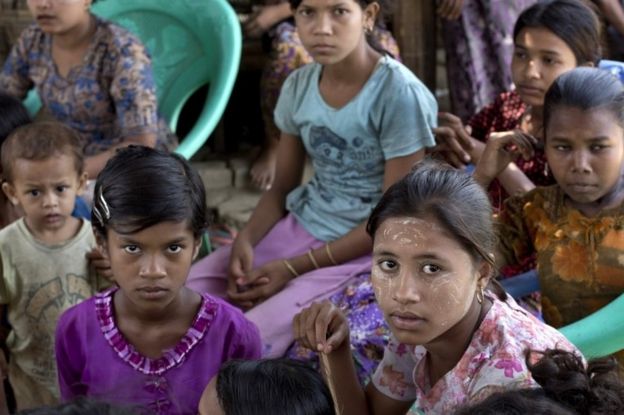 In this May 12, 2015, file photo, ethnic Rohingya sit at a refugee camp north of Sittwe, western Rakhine state, Myanmar.