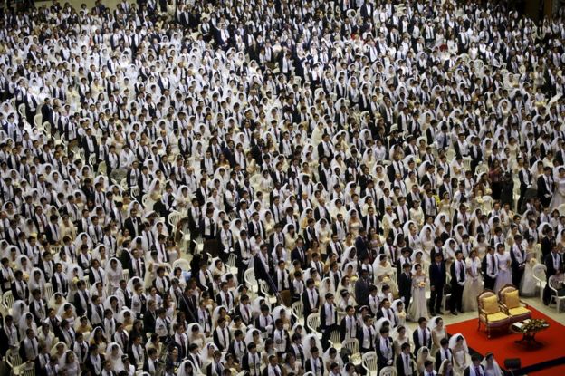 Newlywed couples attend a mass wedding ceremony of the Unification Church at Cheongshim Peace World Centre in Gapyeong, South Korea, 20 February