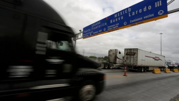 Trucks cross the US-Mexico border in Nuevo Laredo