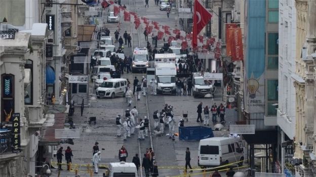 Turkish police, forensics and emergency services, work at the blast scene.