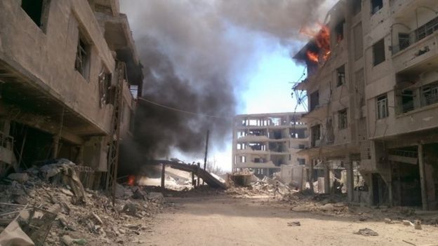 The aftermath of an airstrike in Darayya